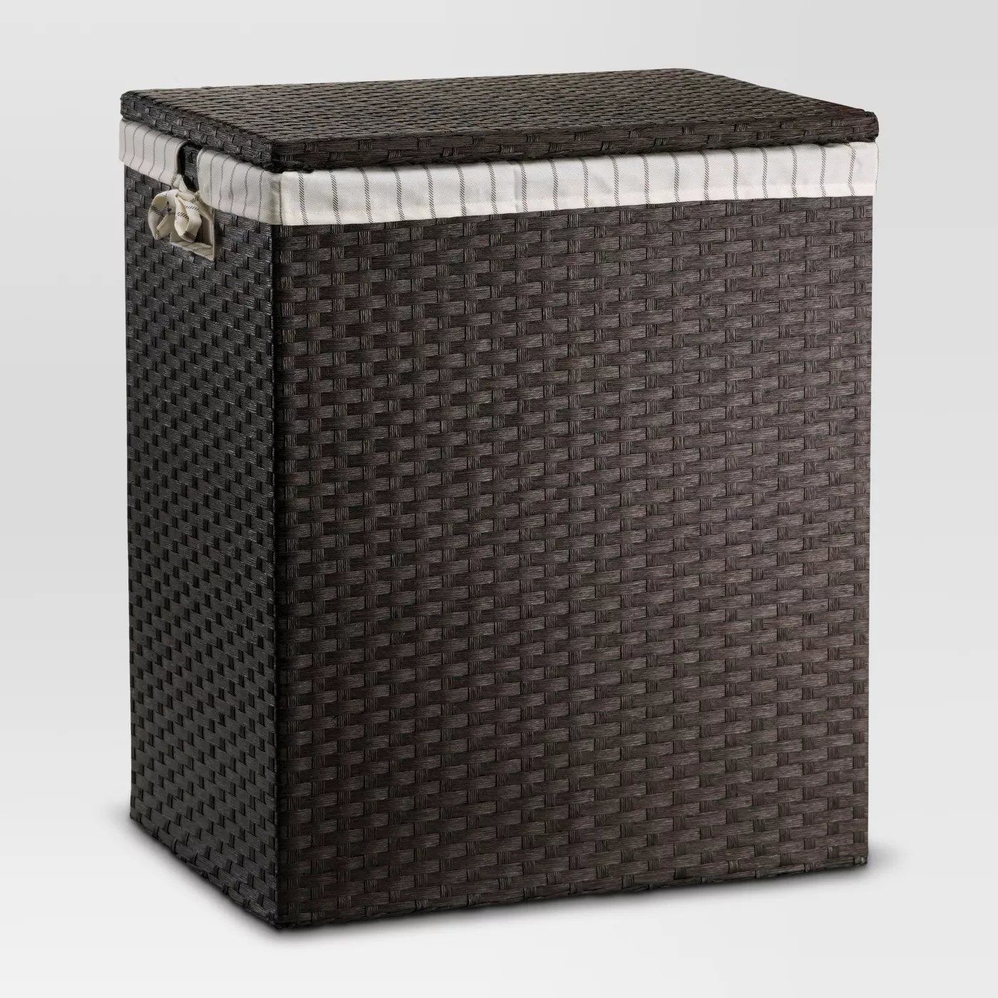 The brown woven hamper with a striped lining inside