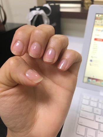 reviewer's before pic of their nails