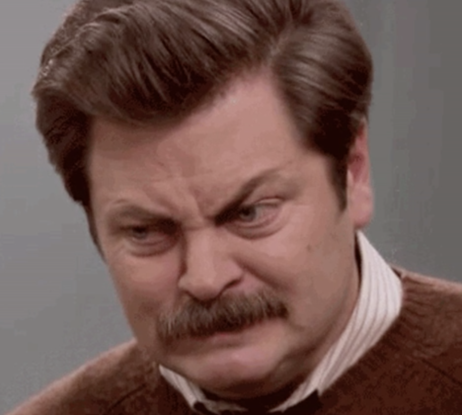 Ron Swanson from &quot;Parks and Recreation&quot; making a puzzled, frustrated expression