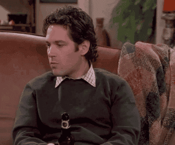 Paul Rudd furrows his brows in confusion and then looks down sadly as Mike on &quot;Friends&quot;