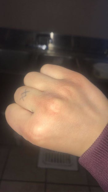 Reviewer's hand after using hand cream