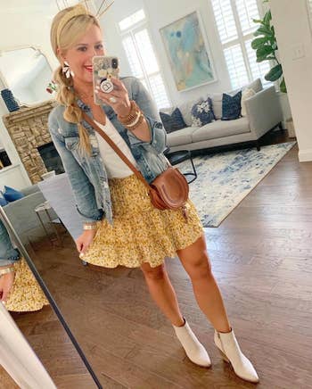 A reviewer wearing the skirt in yellow