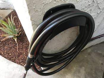 Reviewer photo of holder with black hose