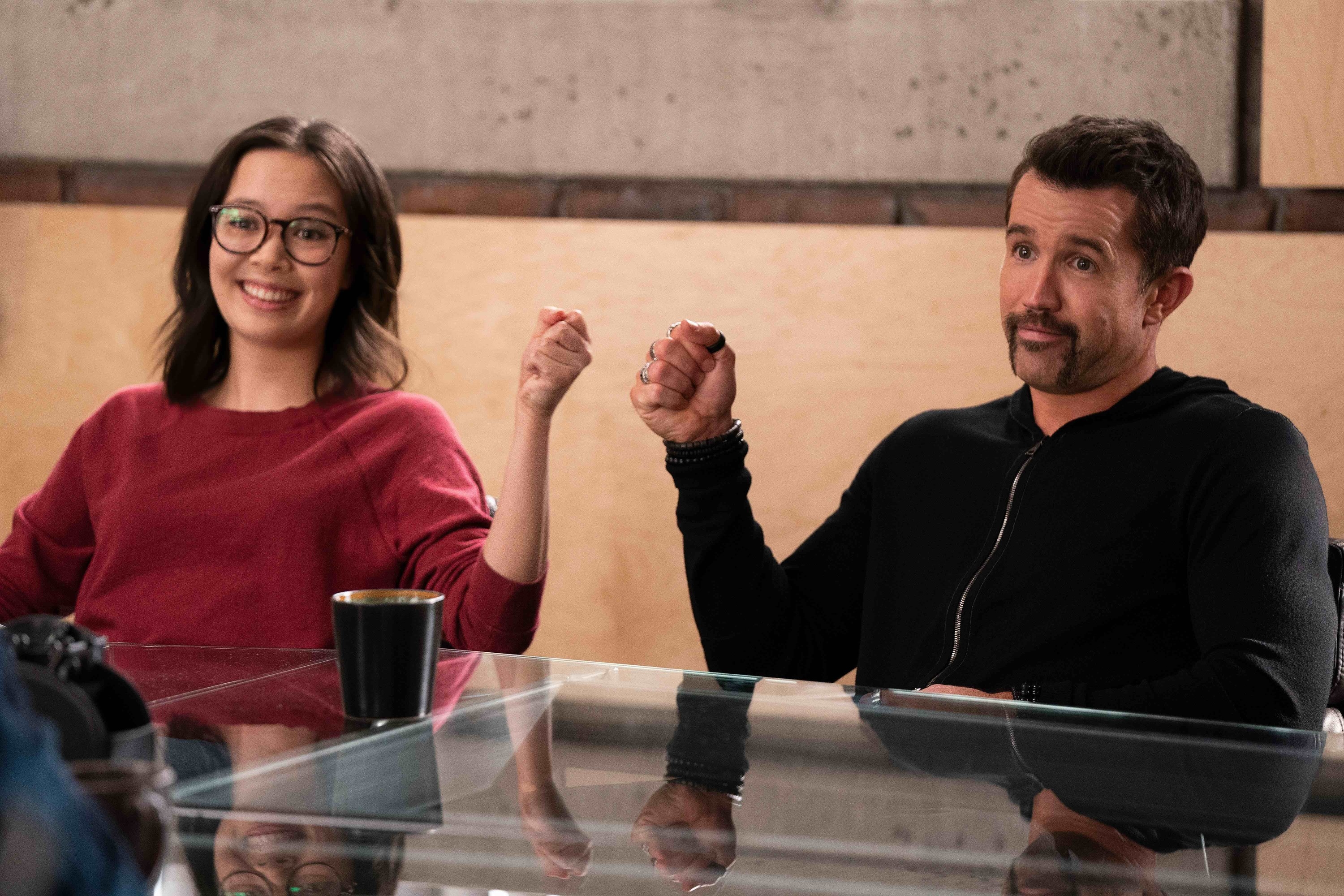 Poppy and Ian fist bumping