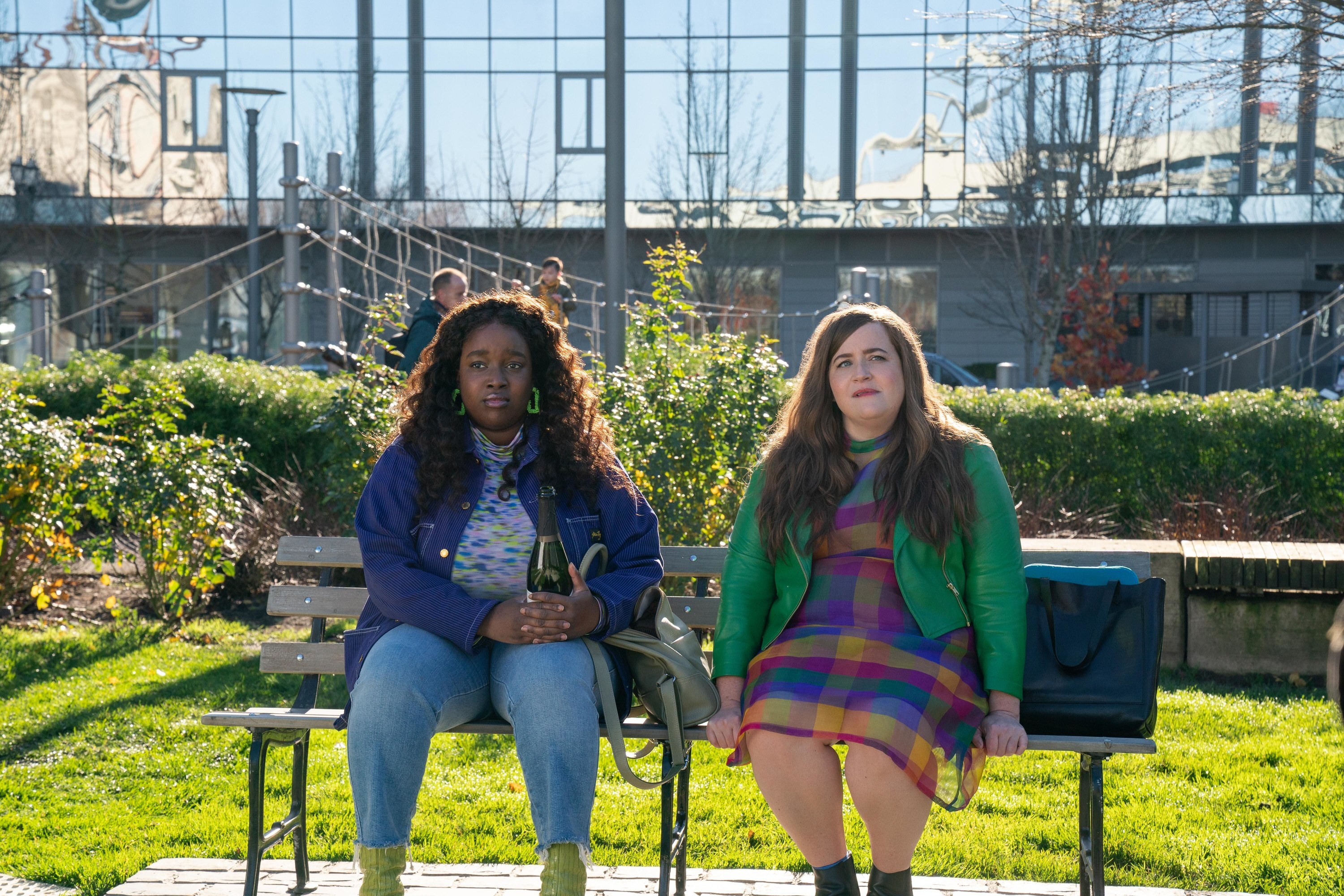 Fran and Annie sitting on a bench 