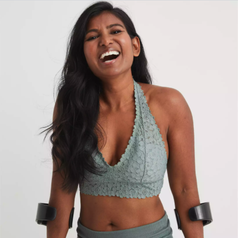 model wearing green bralette