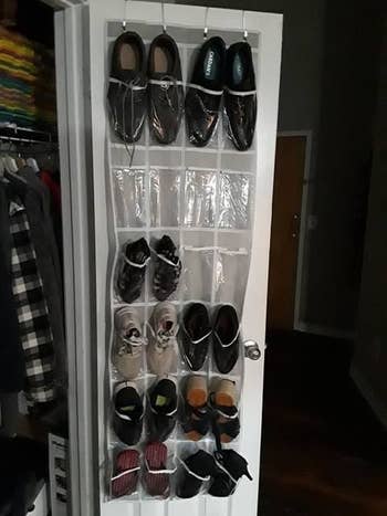 review photo of clear over the door shoe organizer with shoes in it