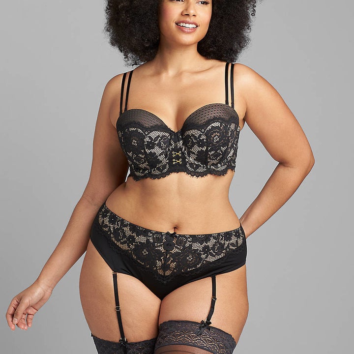 model wearing lace strappy-back garter panty