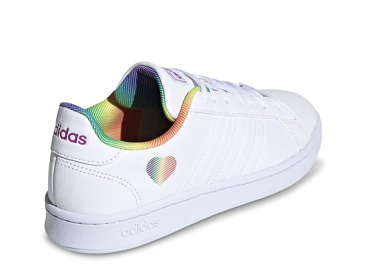 A white sneaker with rainbow designs