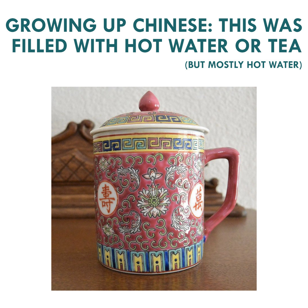 Ceramic mug with various floral and geometric motifs sitting on a wooden table