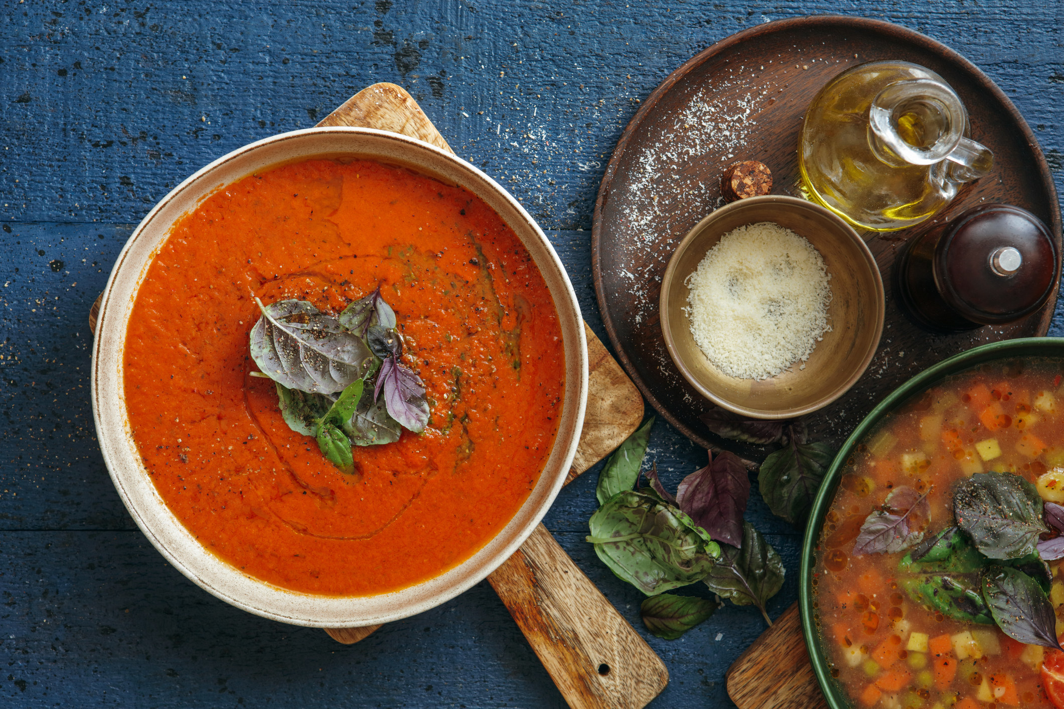 Italian soups with olive oil and cheese on the side