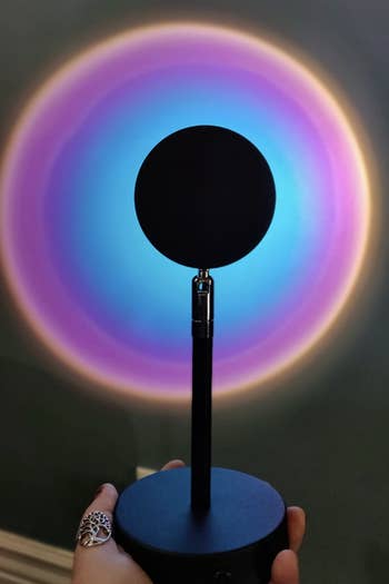 Reviewer's lamp shows purple and blue light on the wall