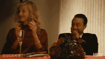 Kieran Culkin as Roman Roy clapping