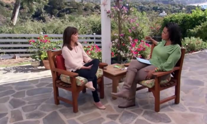 Oprah and Sally sitting on a patio for the interview