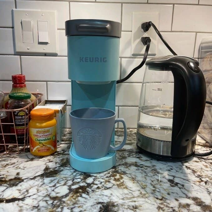 the Keurig in blue on a reviewer&#x27;s counter 