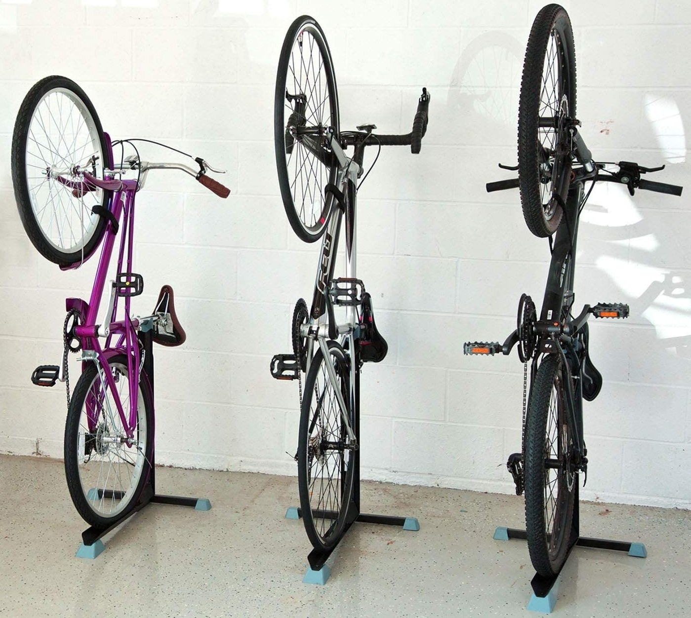Three bikes in the stands