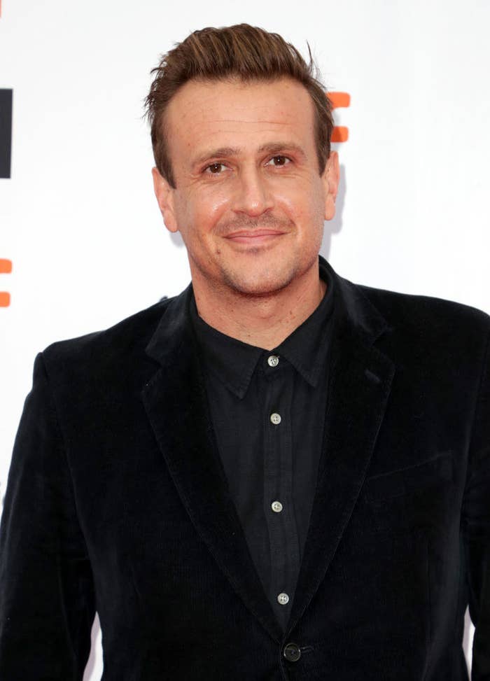 Jason Segel on the red carpet without a tie