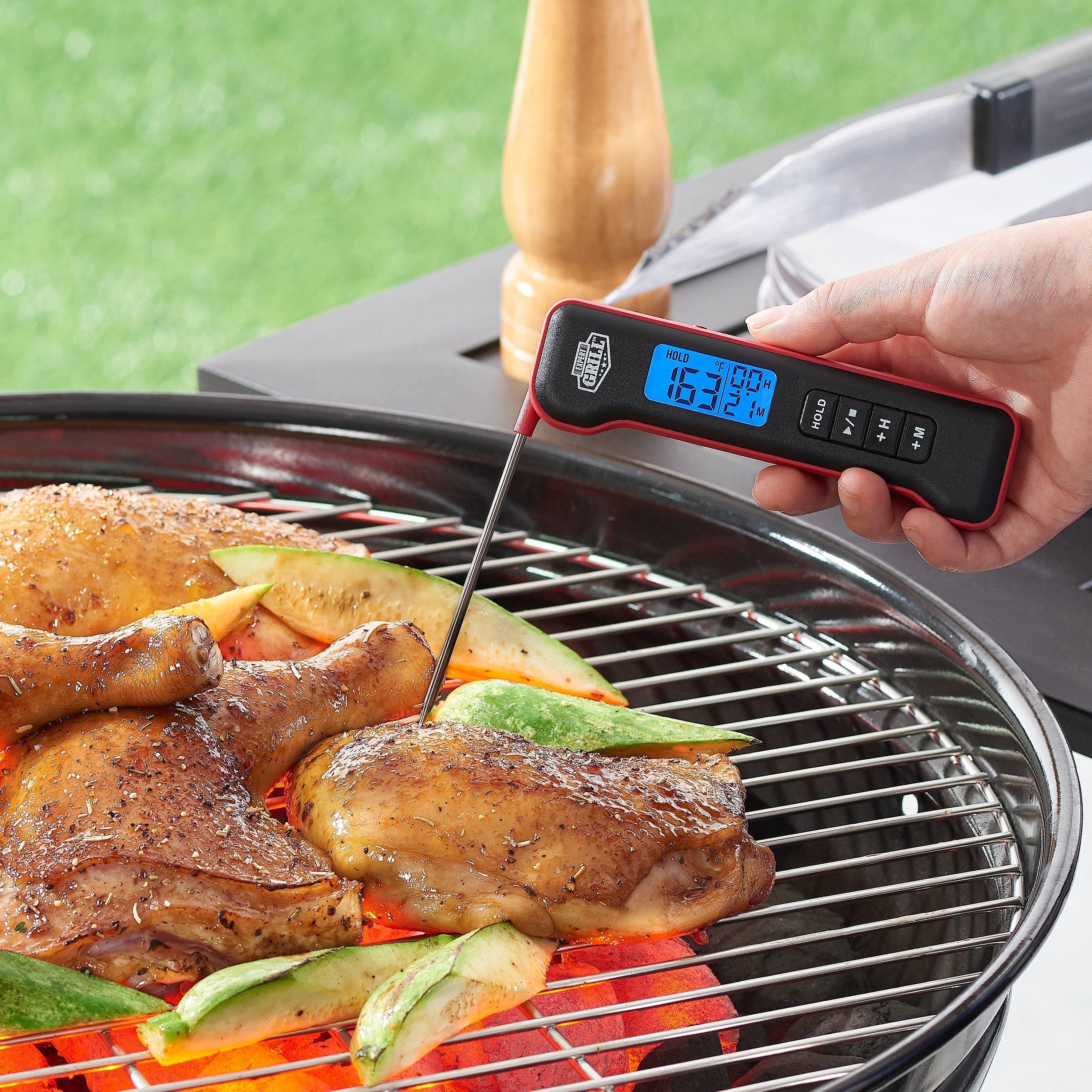 A meat thermometer in a piece of chicken