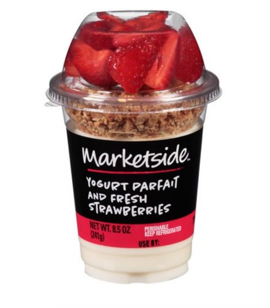 Yogurt parfait with fresh strawberries at the top, granola then yogurt