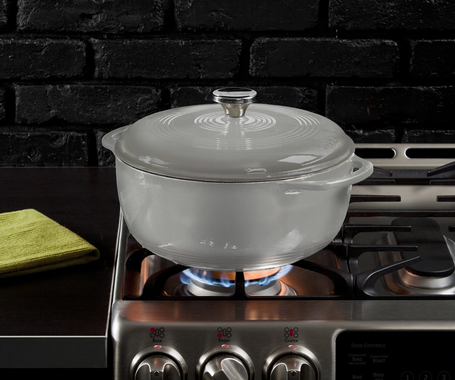 A grey dutch oven on a stove