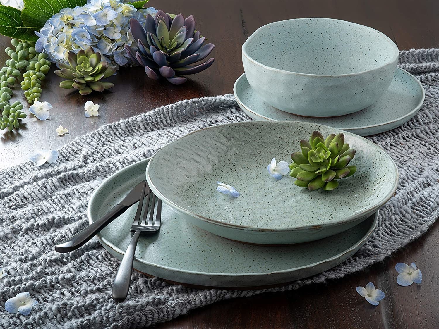 the blue sango kaya ceramic dinnerware set on a dining table