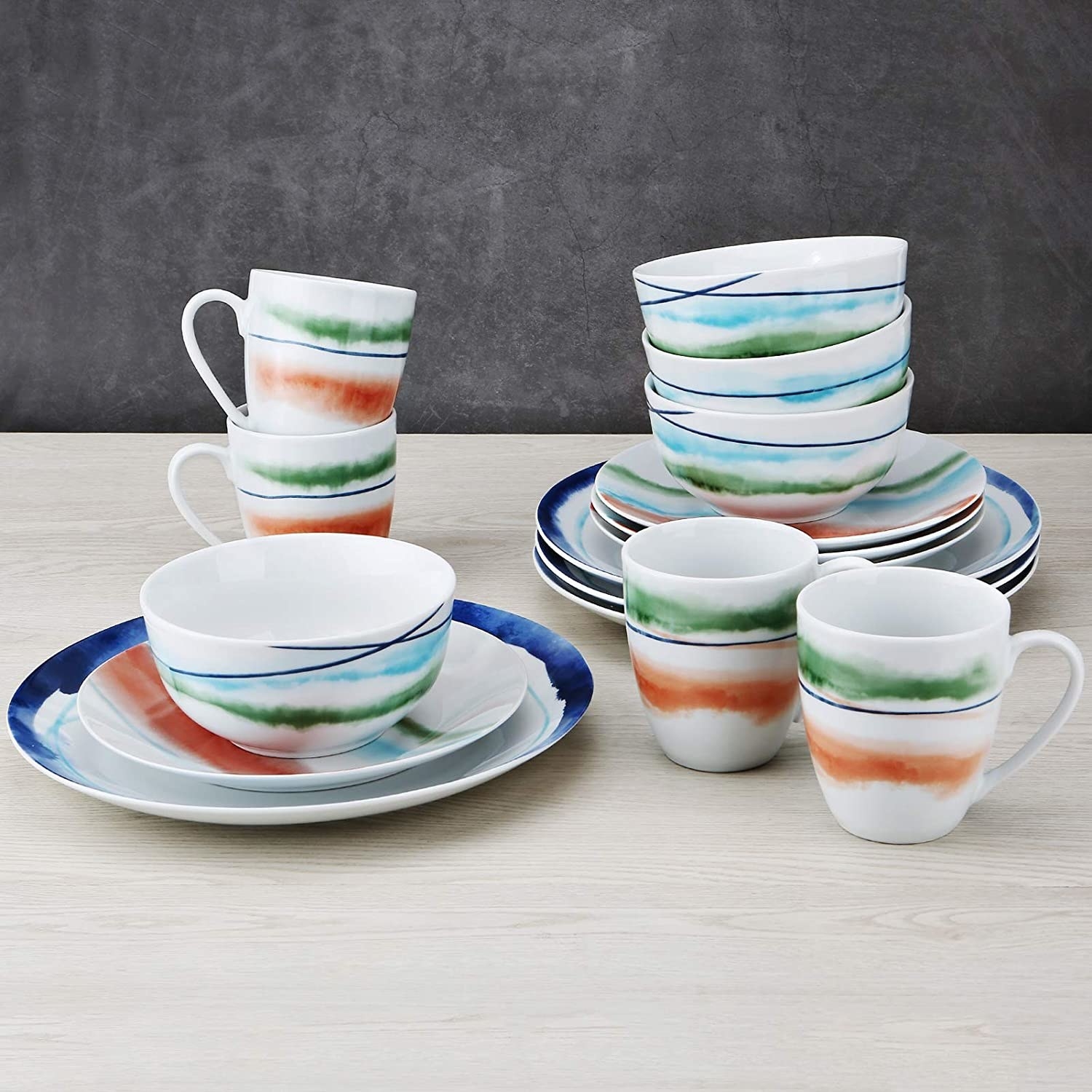 the zyan white fusion dinnerware set stacked on a table