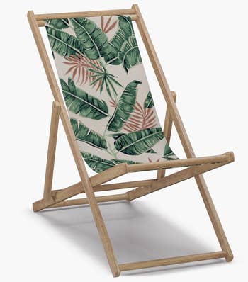 a chair with a banana leaf fabric