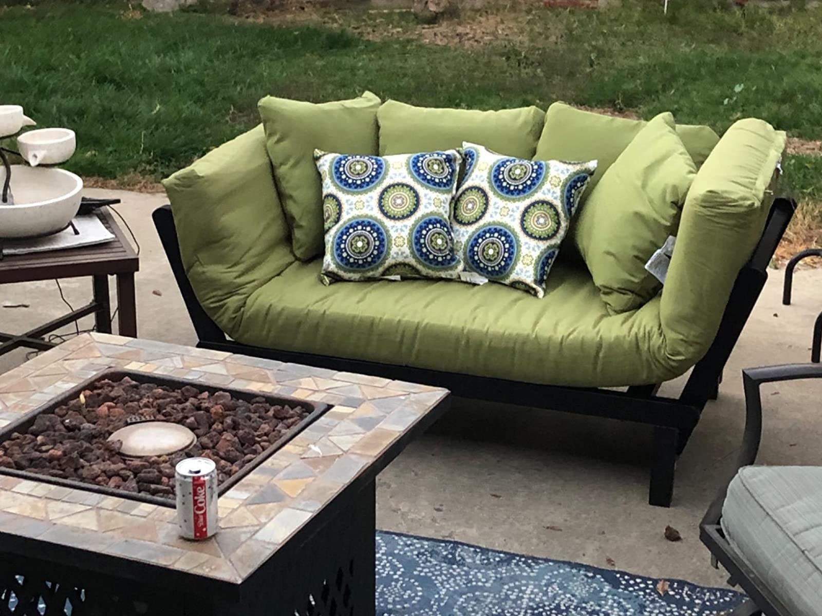 the green futon in a reviewer's backyard 