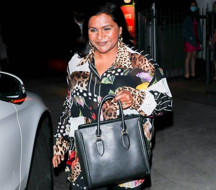 A smiling Mindy Kaling is in good spirits after grabbing a bite at Giorgio Baldi in Santa Monica