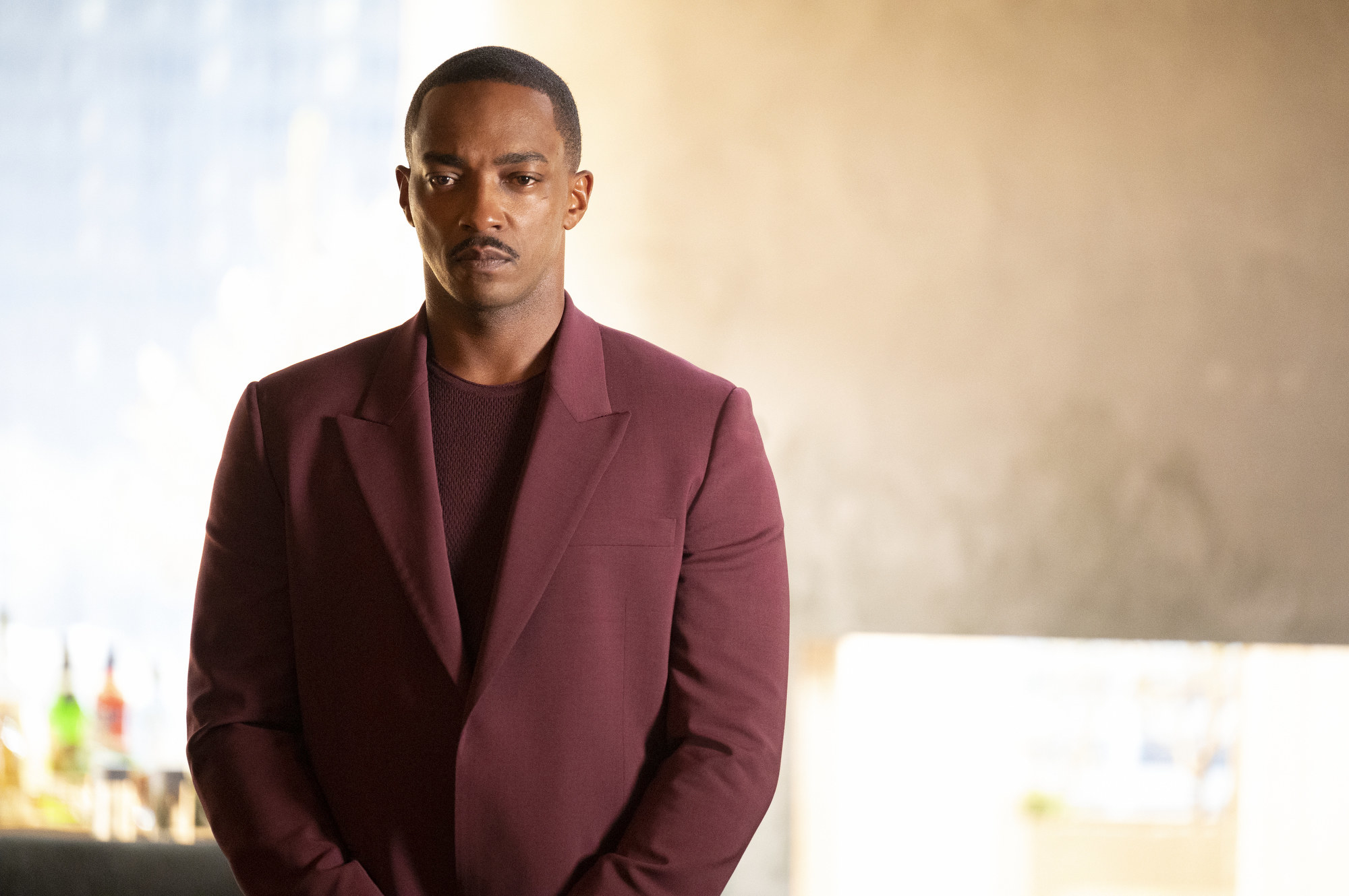 Anthony Mackie standing stoically in a scene from Solos