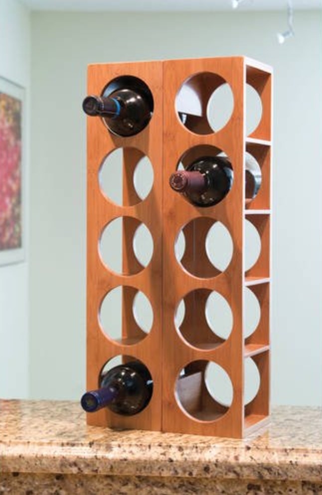 two of the wine racks stacked next to each other with one wine bottle in each side
