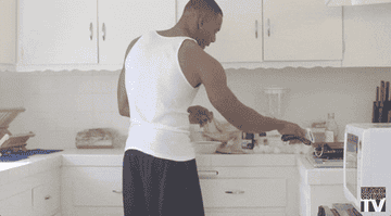 A man making eggs in a kitchen