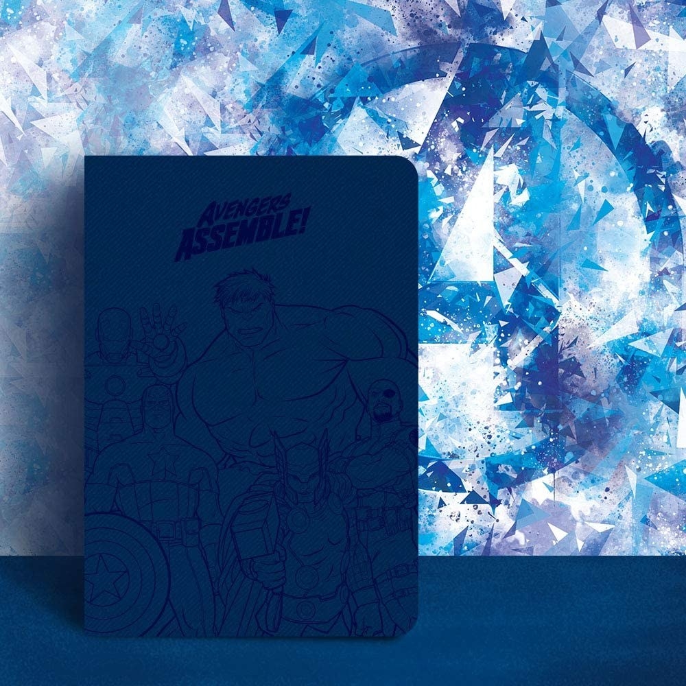 A navy blue diary with the embossed text &#x27;Avengers Assemble&#x27; and the embossed illustrations of Captain America, Iron Man, Hulk, Thor and Nick Fury.