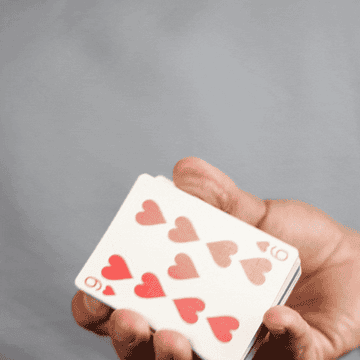 GIF of a hand shuffling cards