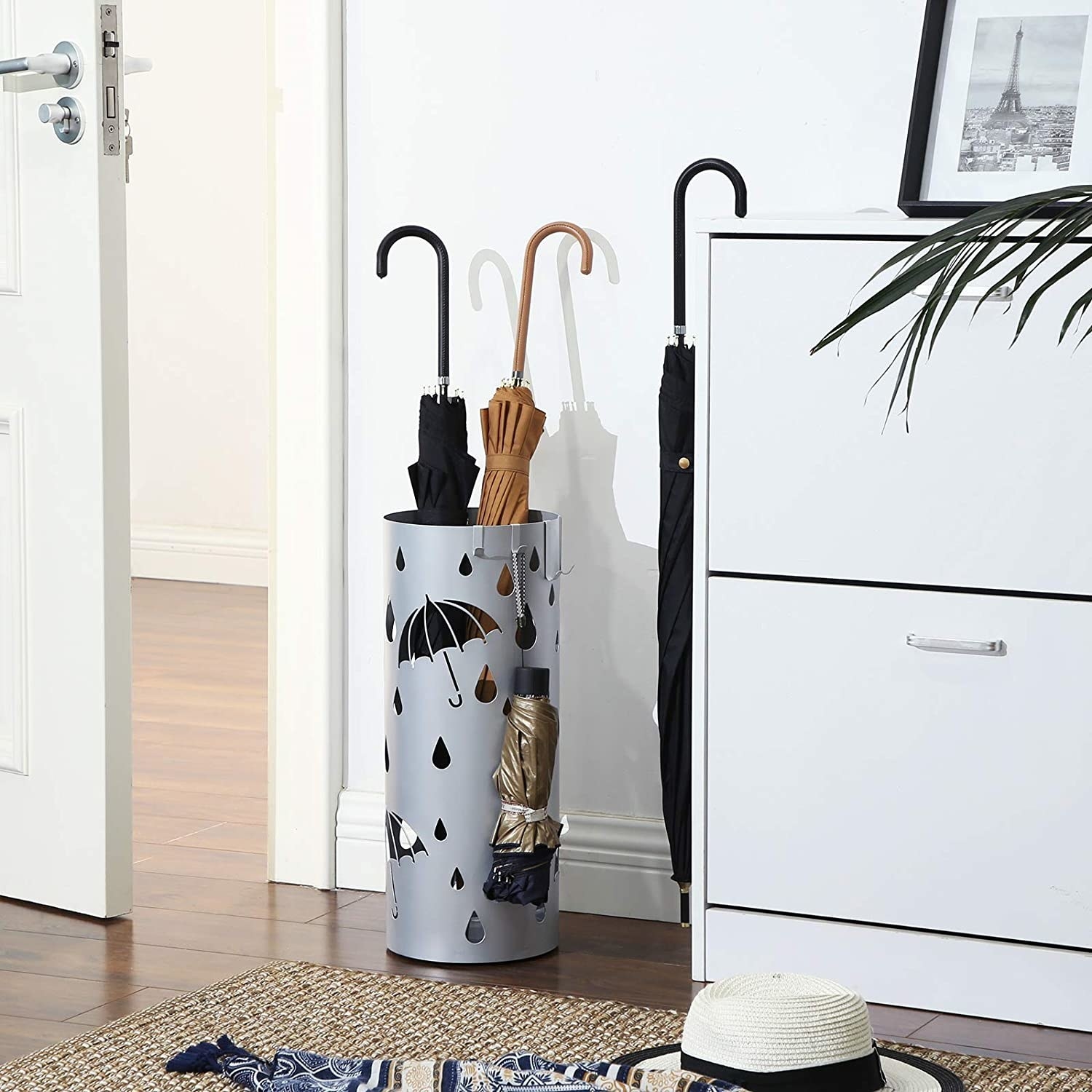 Several umbrellas in the holder