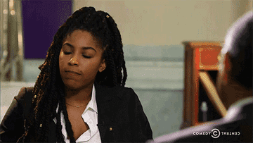 GIF of Jessica Williams on the Daily Show shaking her head in confusion 