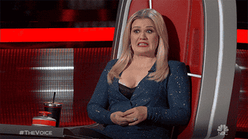 Kelly Clarkson shakes her head with an expression that screams &quot;Yikes&quot;
