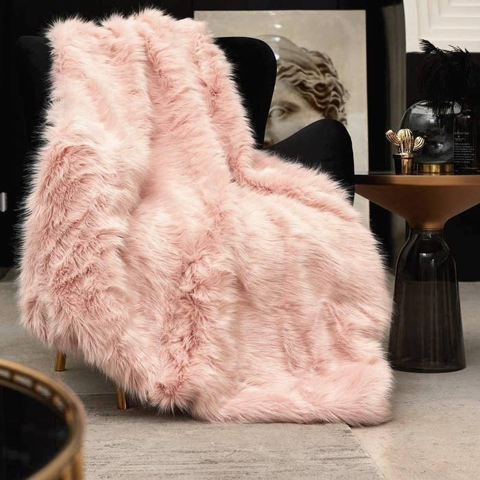 the fur throw on a chair