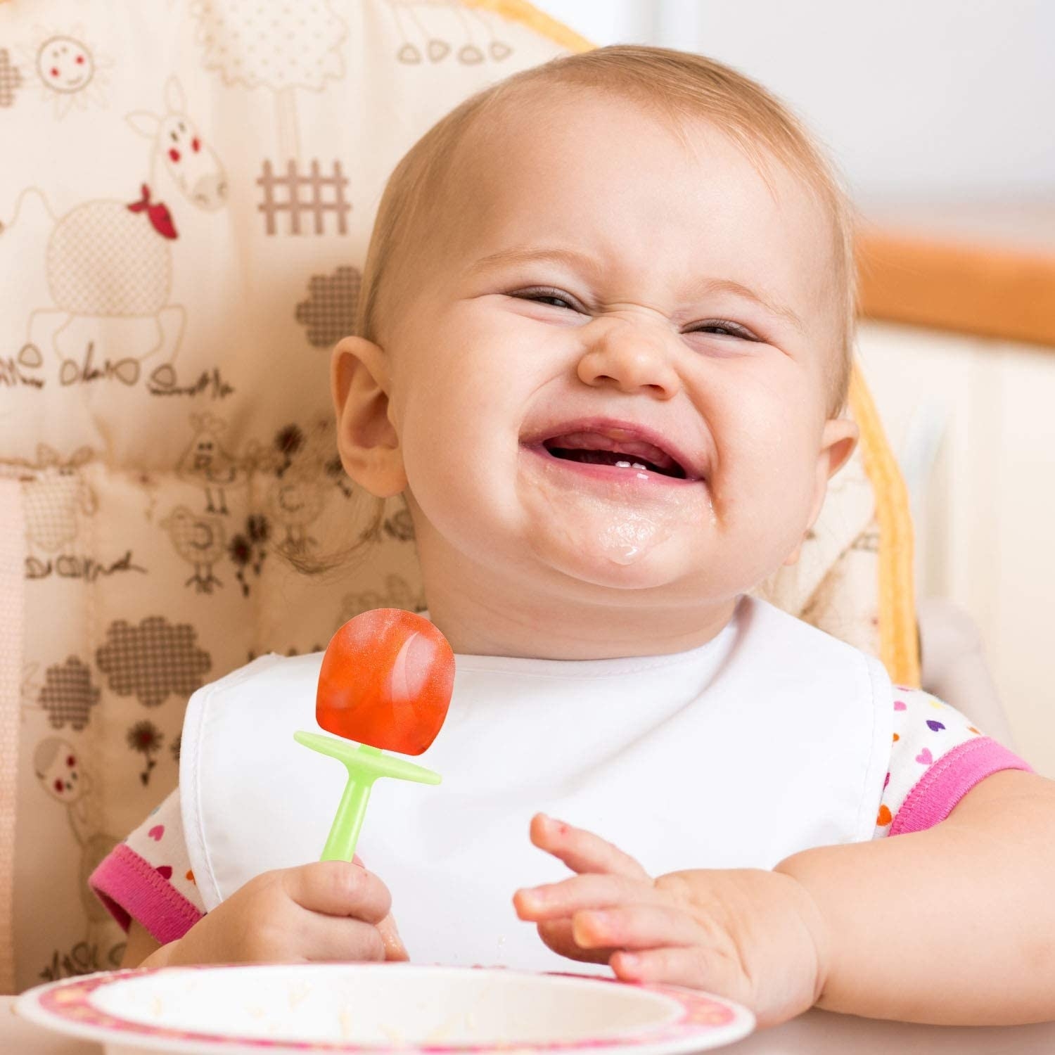 A baby eats a homemade ice pop