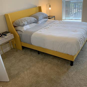 reviewer's platform bed frame in yellow 
