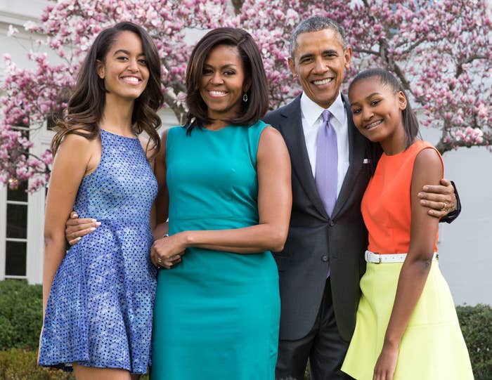 The Obama family poses for a photo outside the White House