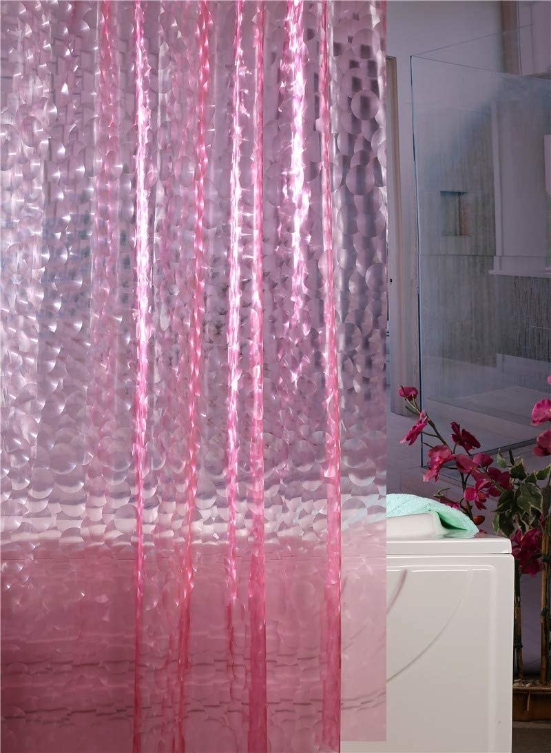 the shower curtain over a tub