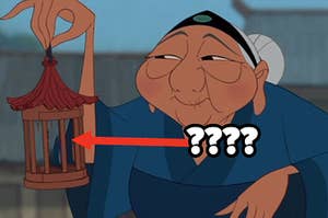 Mulan's grandmother holds an empty cage.