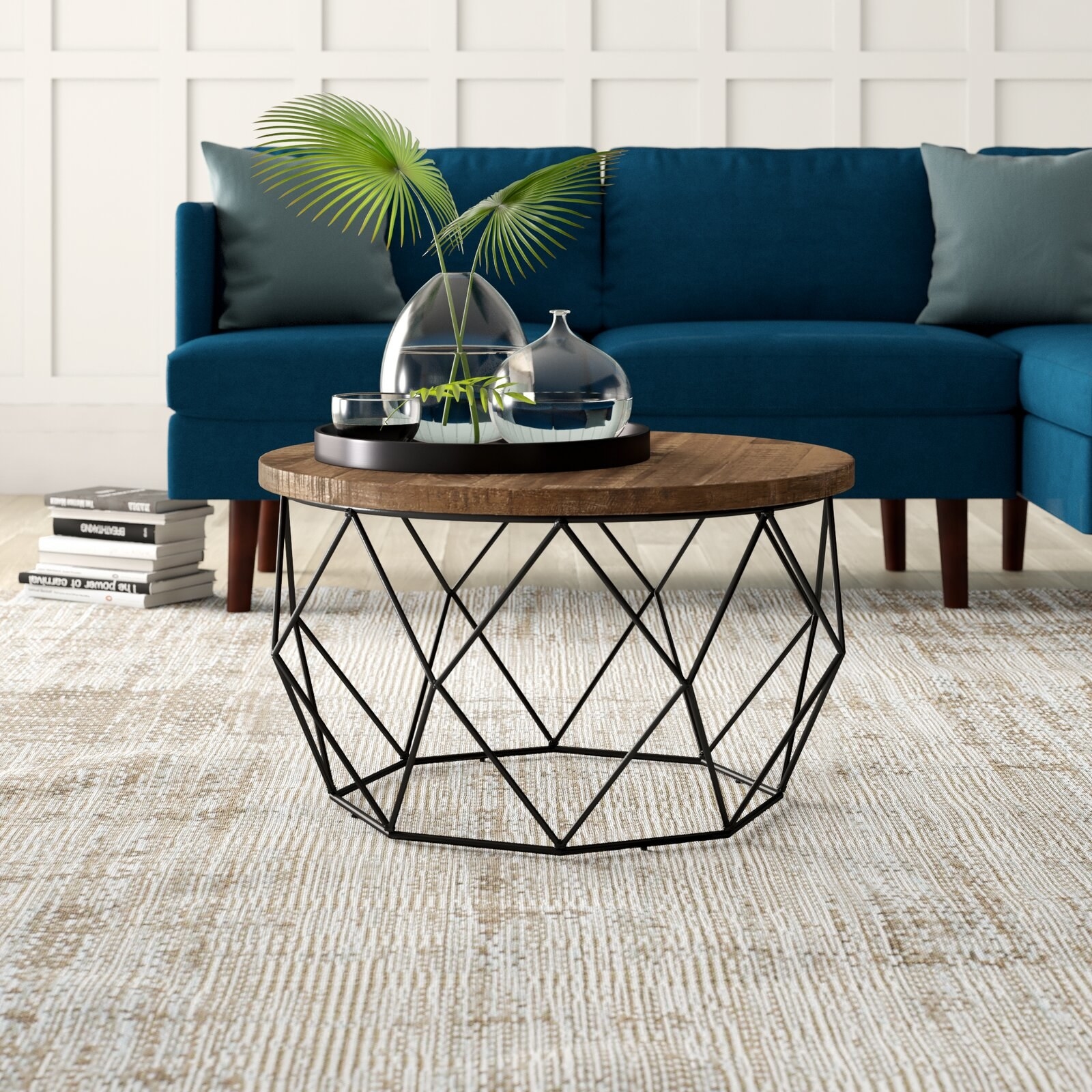 The table, which has a circular, brown, wooden top, and a geometric, cage-style metal base