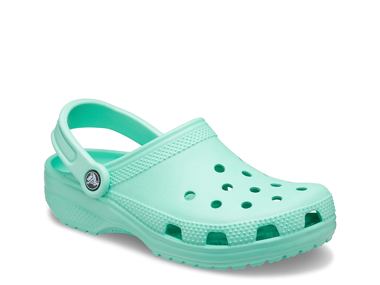 A single green sandal by Crocs