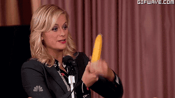 Amy Poehler holding a banana in a sexual way