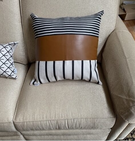 A reviewer photo of the pillow cover, which is rectangular