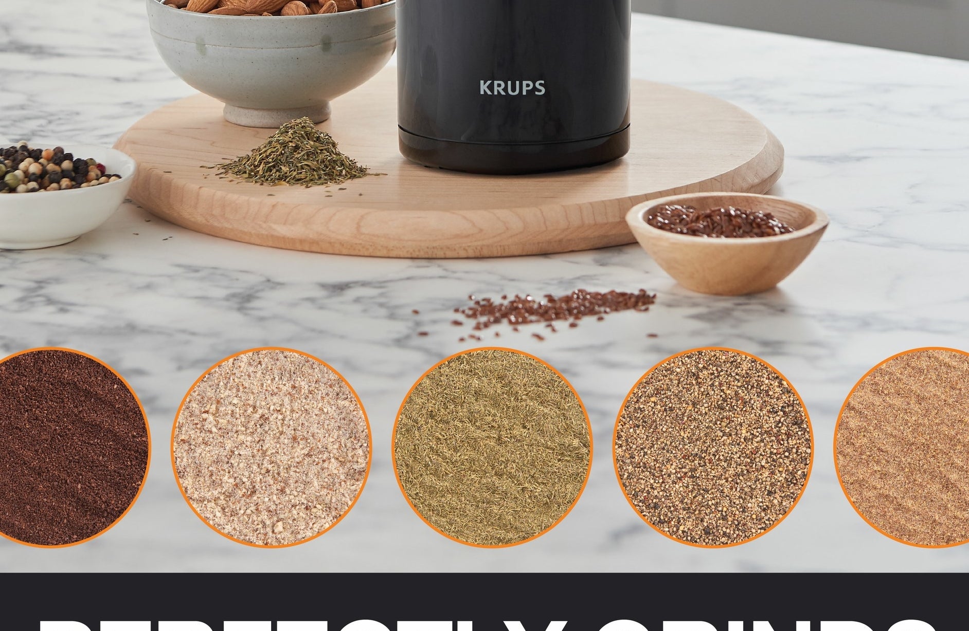 The grinder with nuts, herbs and spices