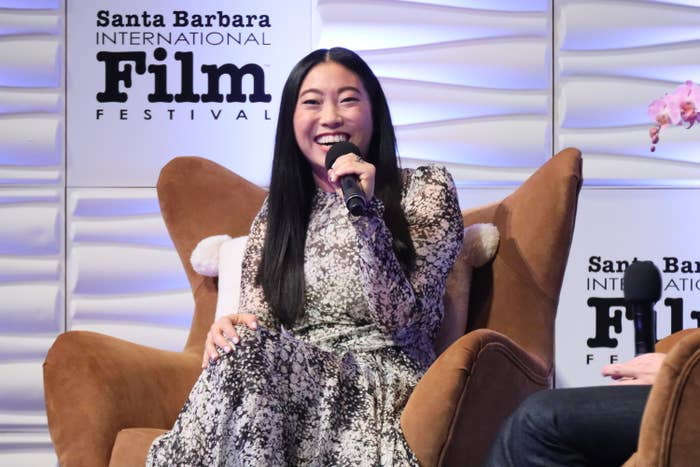 Awkwafina on stage at an event