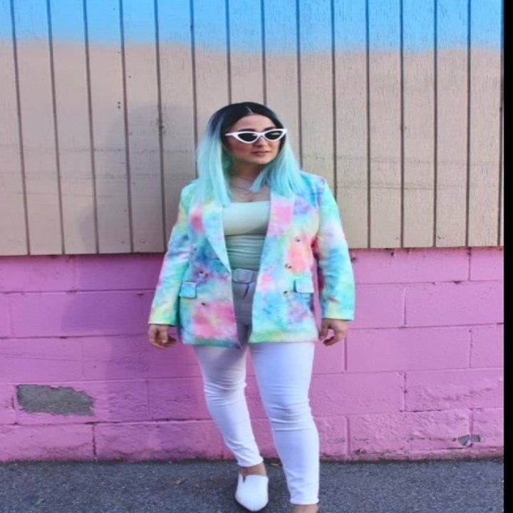 a reviewer wearing the wig